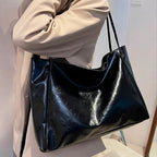 Patrizia | Bolsa con acabado brillante