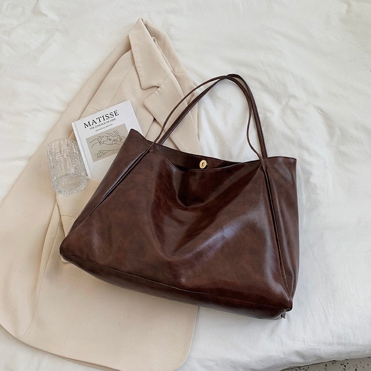 Patrizia | Bolsa con acabado brillante