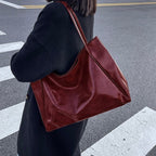 Patrizia | Bolsa con acabado brillante