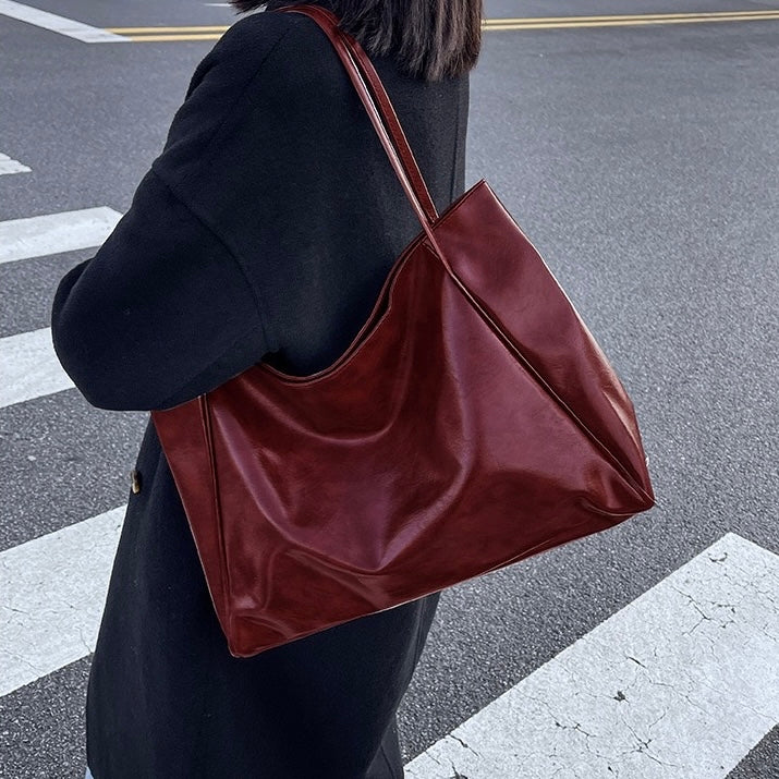Patrizia | Bolsa con acabado brillante
