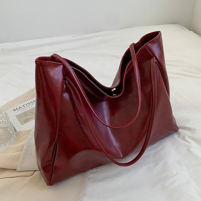 Patrizia | Bolsa con acabado brillante