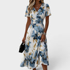 Eloísa | Vestido midi floral cruzado con detalles dorados