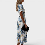 Eloísa | Vestido midi floral cruzado con detalles dorados