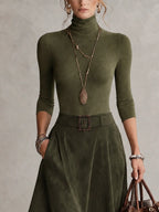 Pía | Conjunto de blusa de cuello alto y falda asimétrica