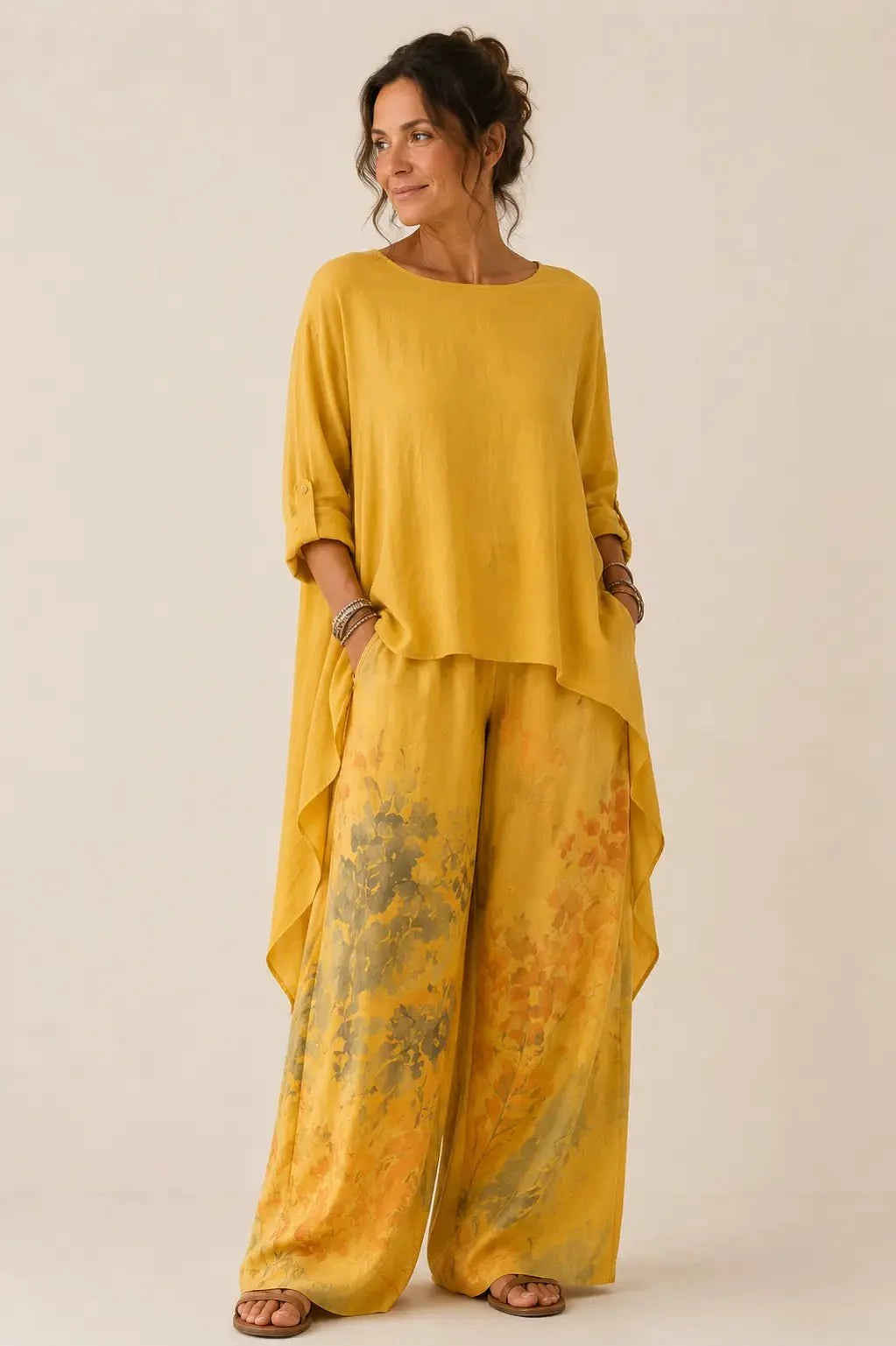 Fiorella | Conjunto floral de blusa asimétrica y pantalón de pierna ancha