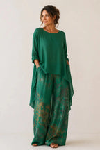 Fiorella | Conjunto floral de blusa asimétrica y pantalón de pierna ancha